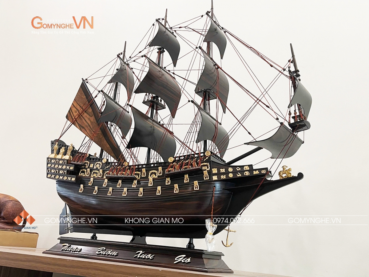 Mô hình thuyền trang trí khong gian Mô hình thuyền buồm gỗ mun 80x85x25cm chế tác thủ công tỉ mỉ, mang vẻ đẹp cổ điển và ý nghĩa thuận buồm xuôi gió. Phù hợp phòng khách, phòng làm việc, văn phòng và làm quà tặng.